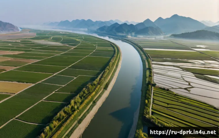 Home 17 북한의 섬 황금평과 신도 - Photorealistic aerial panorama of two low-lying river islands in the broad Yalu River on the North K...
